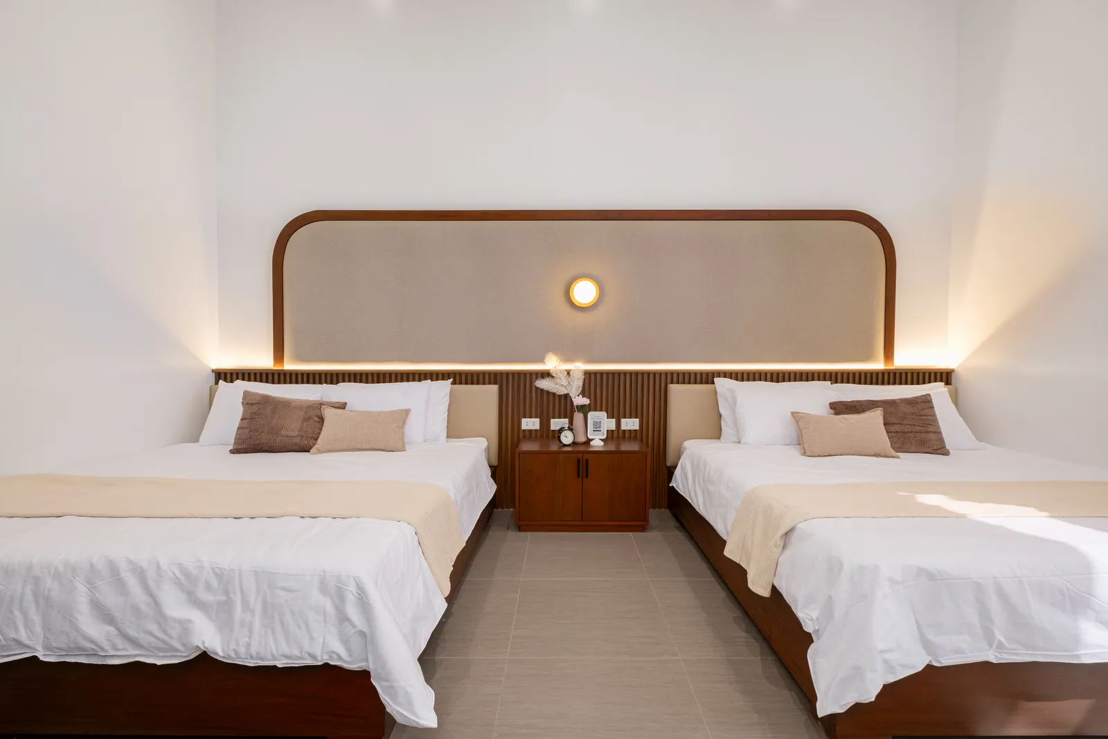 Spacious family suite featuring two king-size beds, elegant interiors, and comfortable accommodations at The Kasiden Private Resort in Alfonso, Cavite.